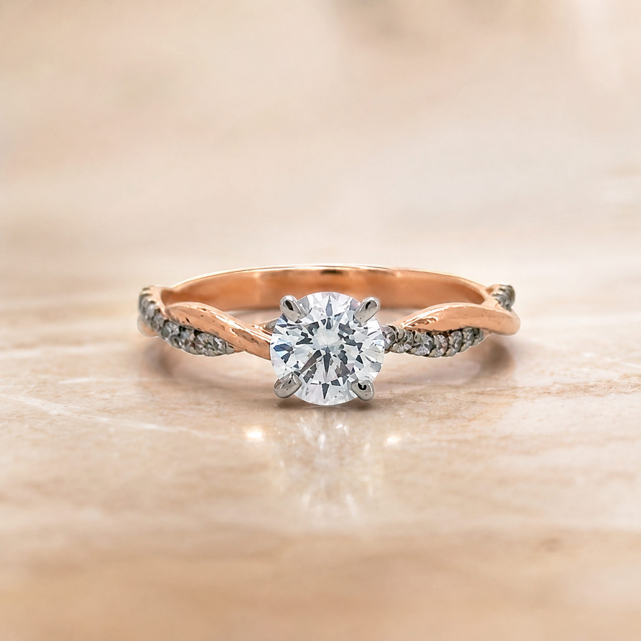 Elegant Twisted Rose Gold Solitaire Ring