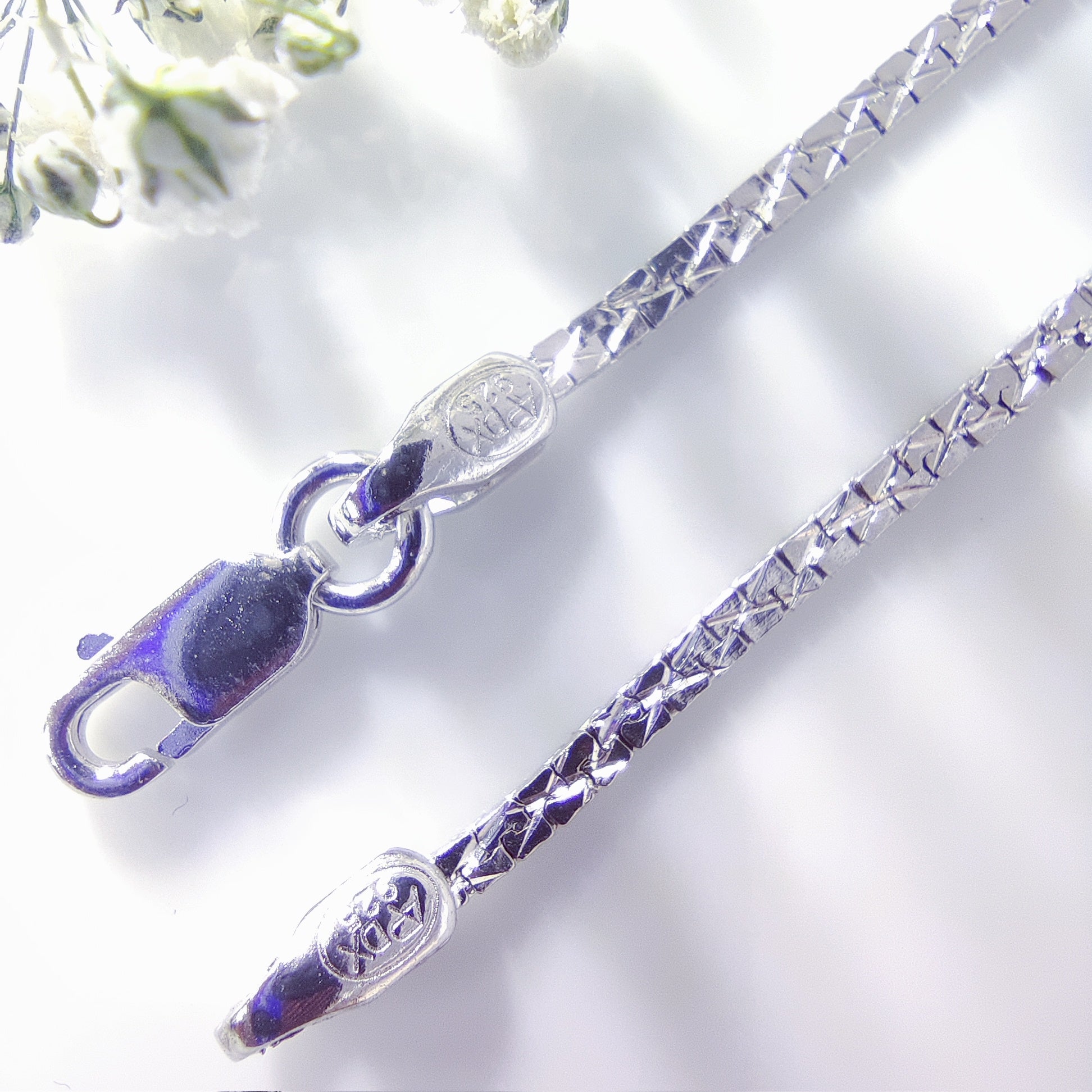 Radiant Twist Silver Chain