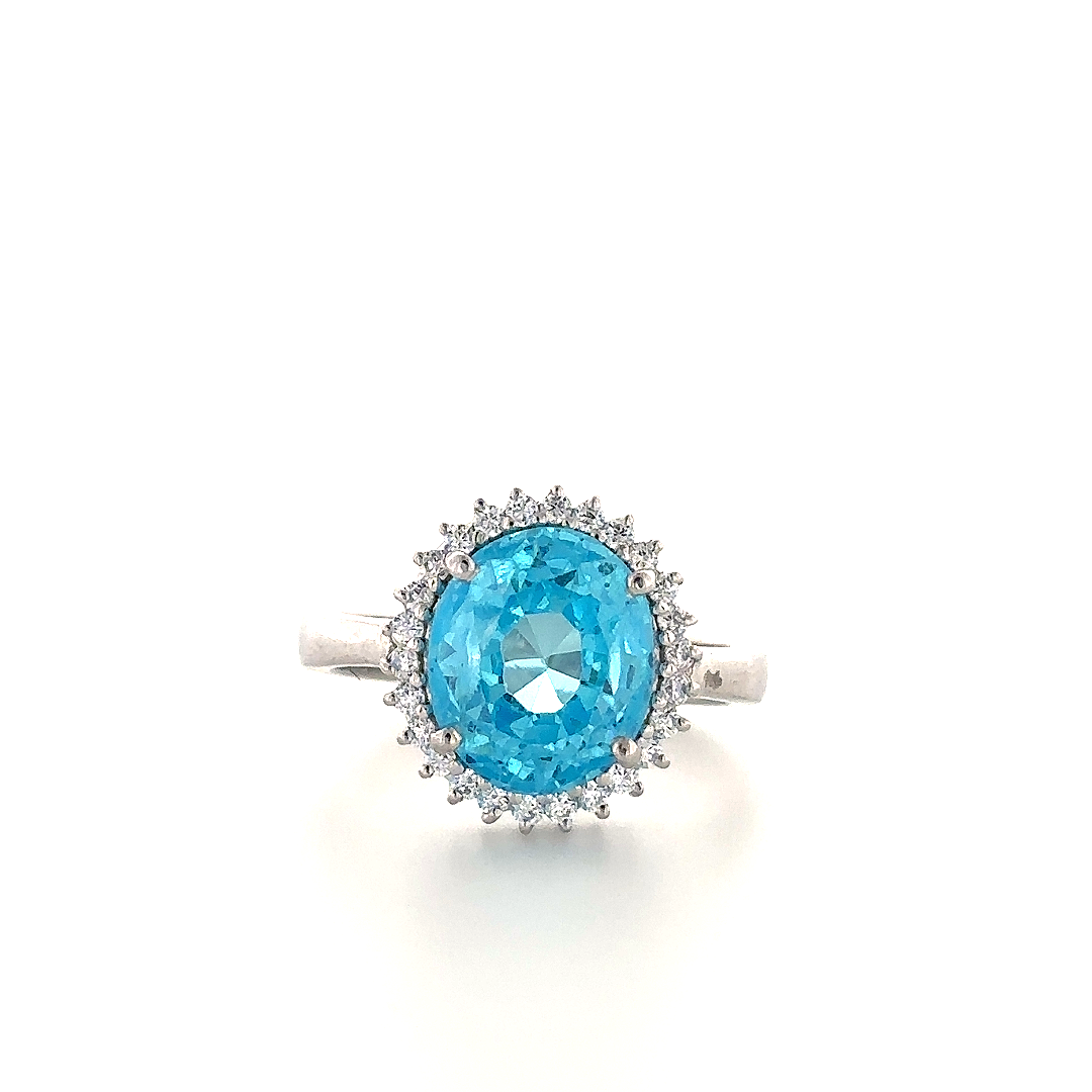 Elegant Blue Topaz Halo Ring